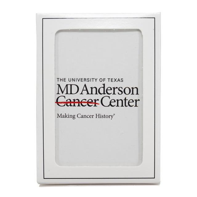 Set of white playing cards featuring the black MD Anderson logo.