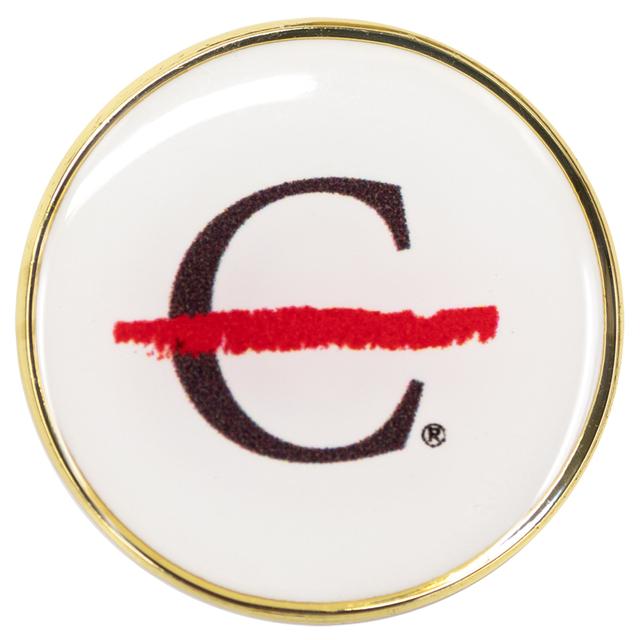 White lapel pin featuring the black strikethrough "C".
