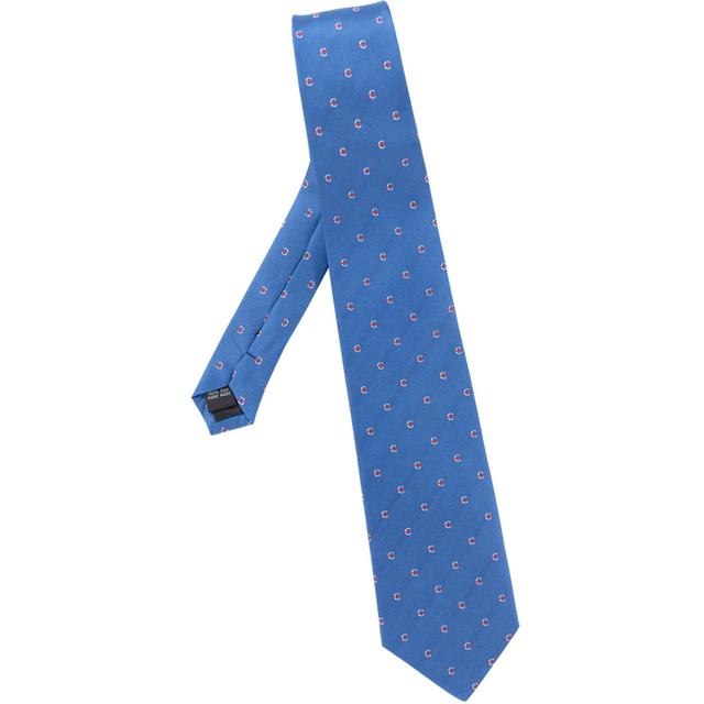 Blue silk tie with the white strikethrough 'C' pattern.